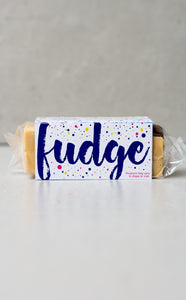 Creme Egg white chocolate fudge in purple branded packaging 