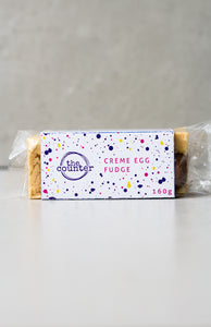 Creme Egg white chocolate fudge in purple branded packaging 